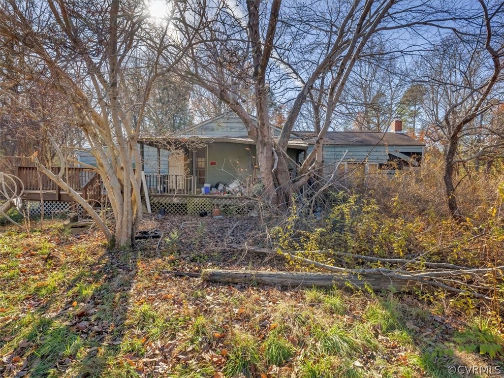 9601 Cattail Road Chesterfield, VA 23838 - Photo 5 of 16 a backyard of a house with lots of green space
