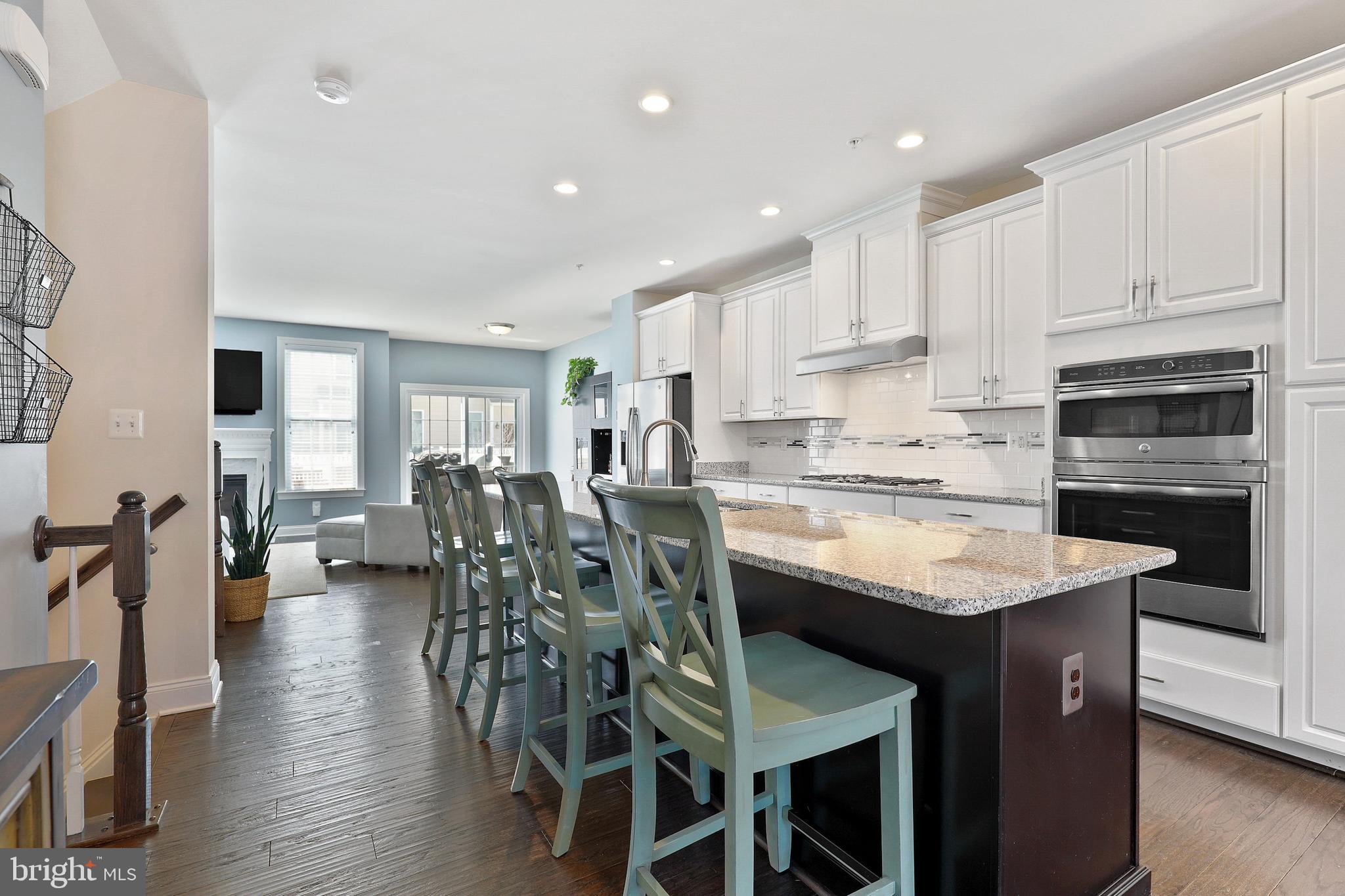 2604 Maple Rock Road Hanover, MD 21076 - Photo 18 of 57 Plenty of island seating, wall oven and microwave