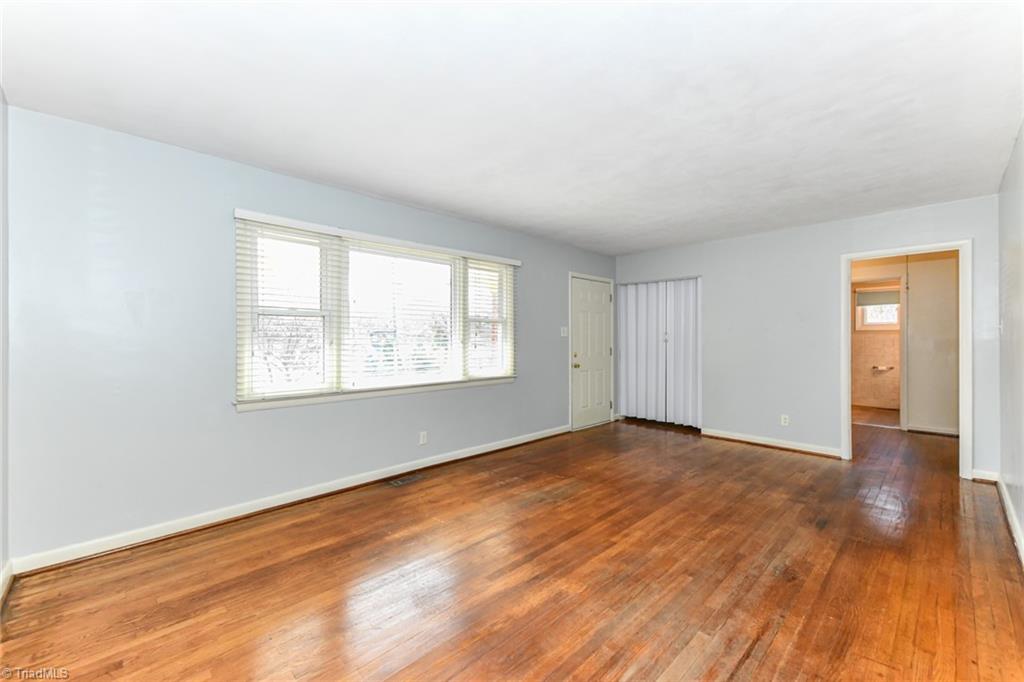 2206 Springhill Road Greensboro, NC 27403 - Photo 6 of 27 Large living room with ample natural light