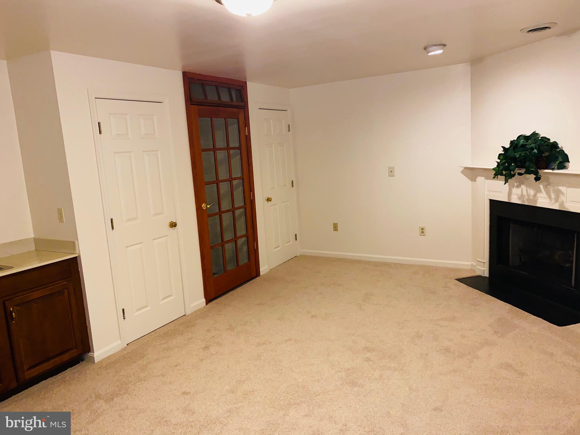 2017 Raleigh Road Hummelstown, PA 17036 - Photo 20 of 29 Lower level family room with a fireplace w /mantle
