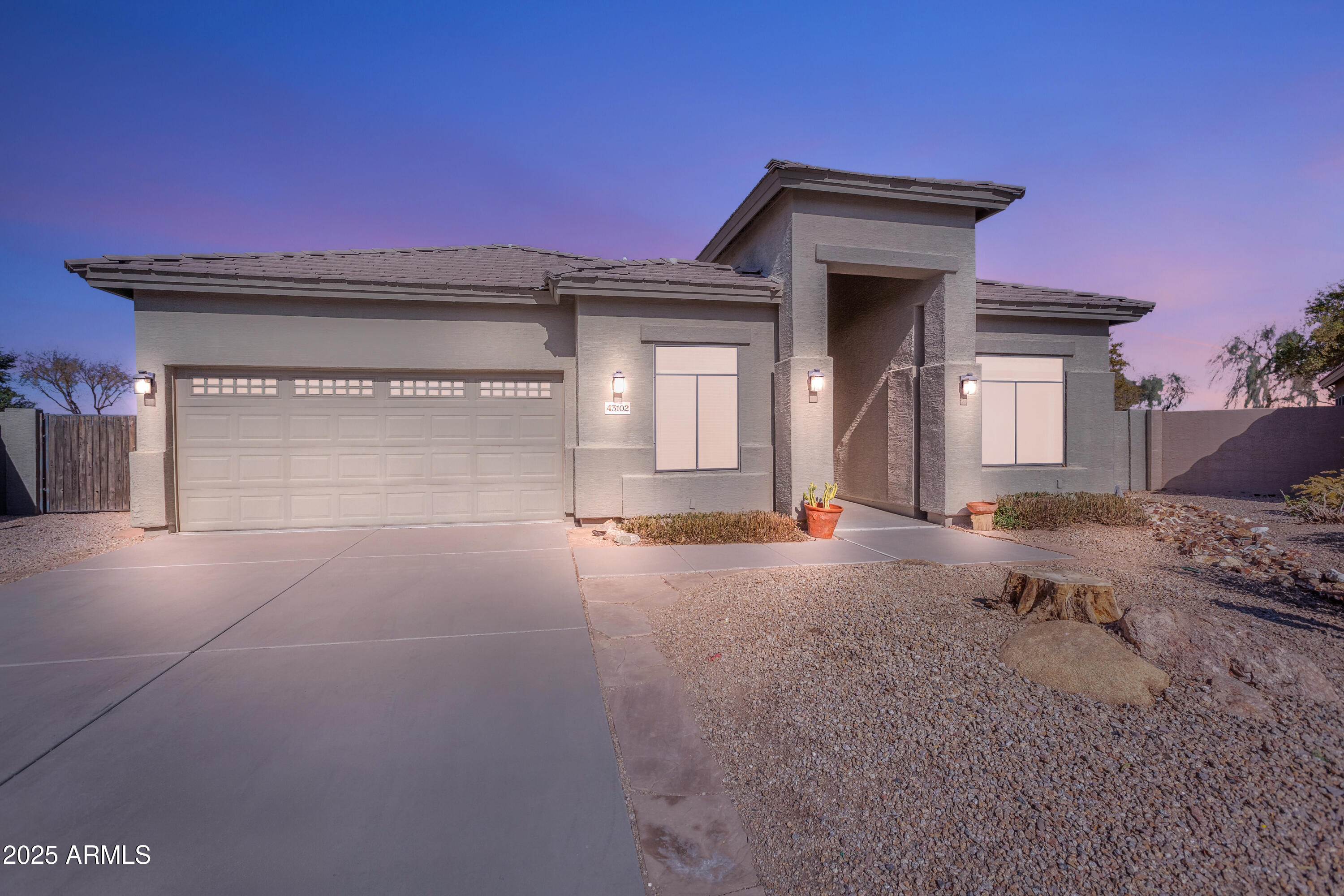 43102 West Venture Road Maricopa, AZ 85138 - Photo 2 of 47 Twilight Front of house L angle