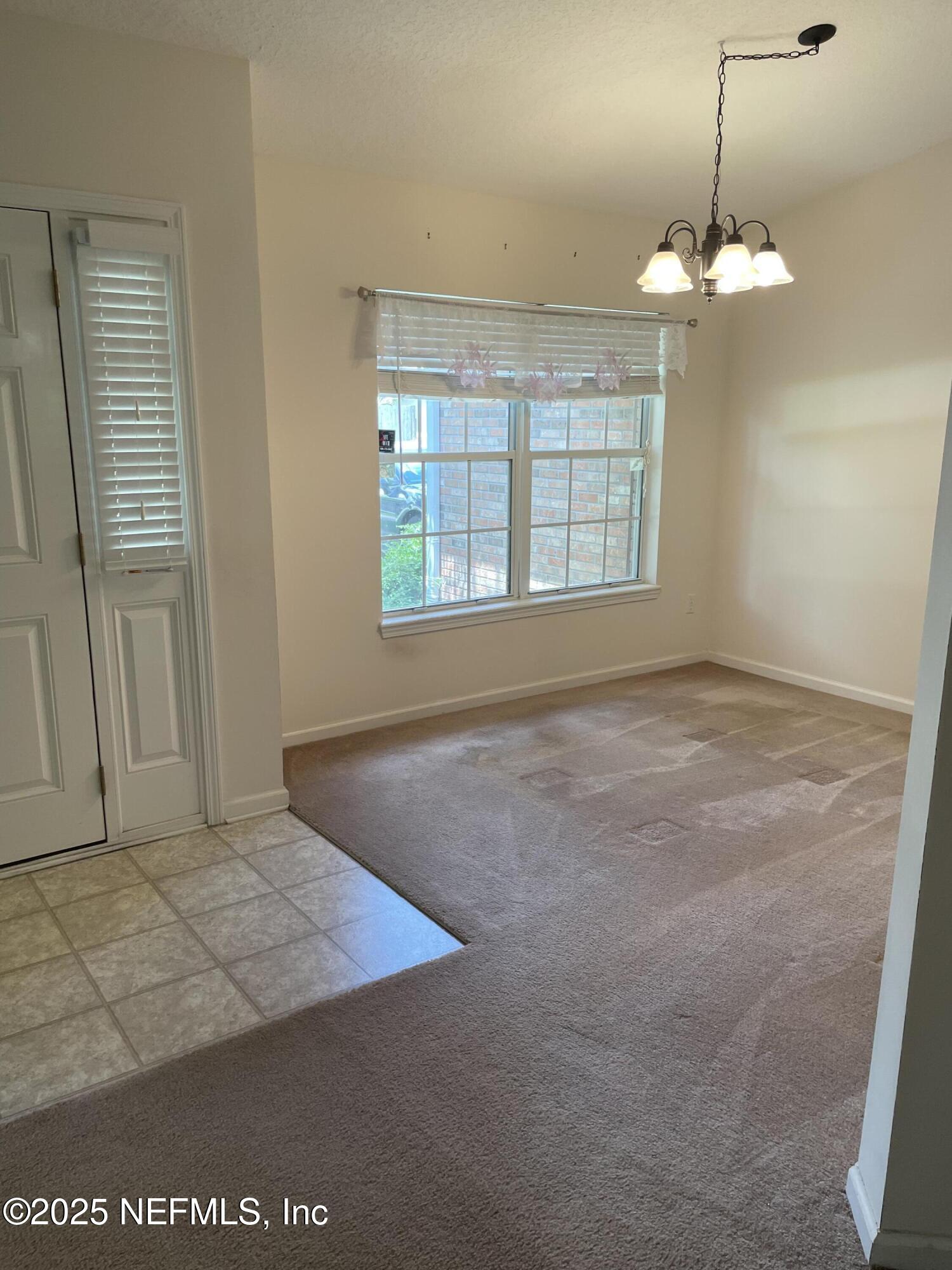 12551 Arrowleaf Lane Jacksonville, FL 32225 - Photo 6 of 14 a view of an empty room with a window