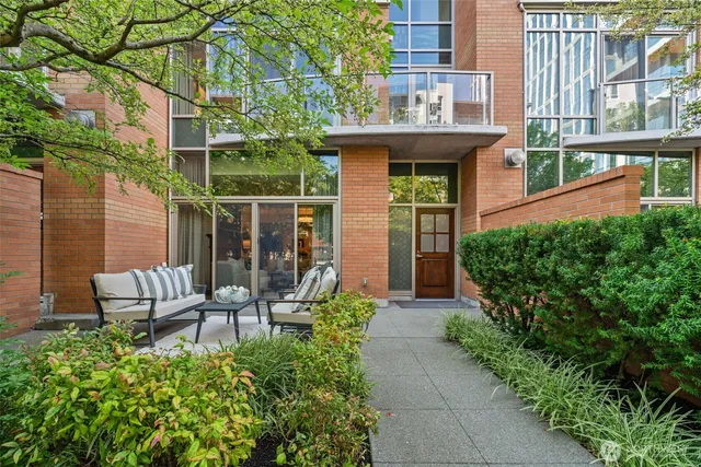 a house view with a seating space and garden view