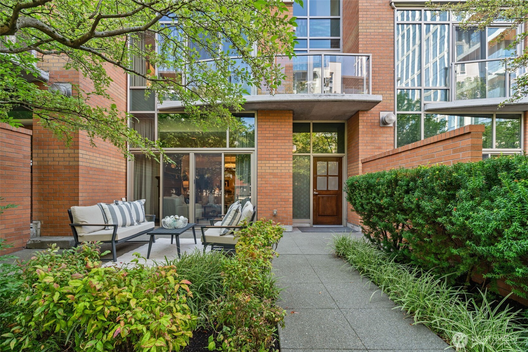 a house view with a seating space and garden view