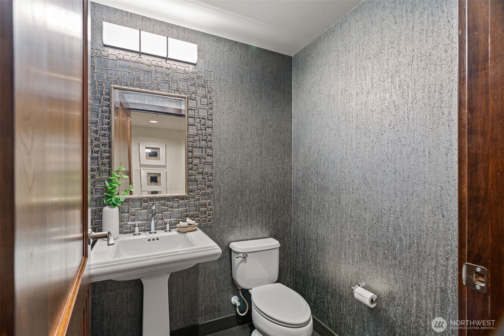 10616 Northeast 9th Place, Unit TH4 Bellevue, WA 98004 - Photo 14 of 39 a bathroom with a toilet a sink and mirror