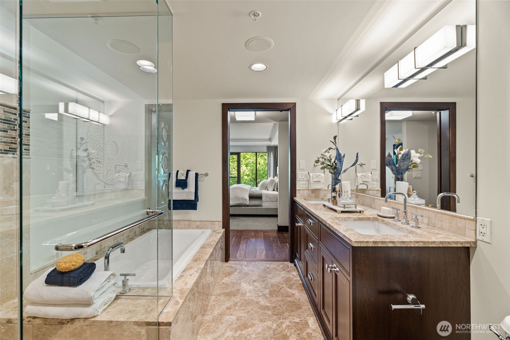 10616 Northeast 9th Place, Unit TH4 Bellevue, WA 98004 - Photo 20 of 39 a large bathroom with a tub double vanity sink and a mirror