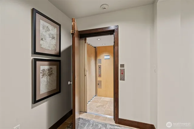 a view of a hallway with elevator