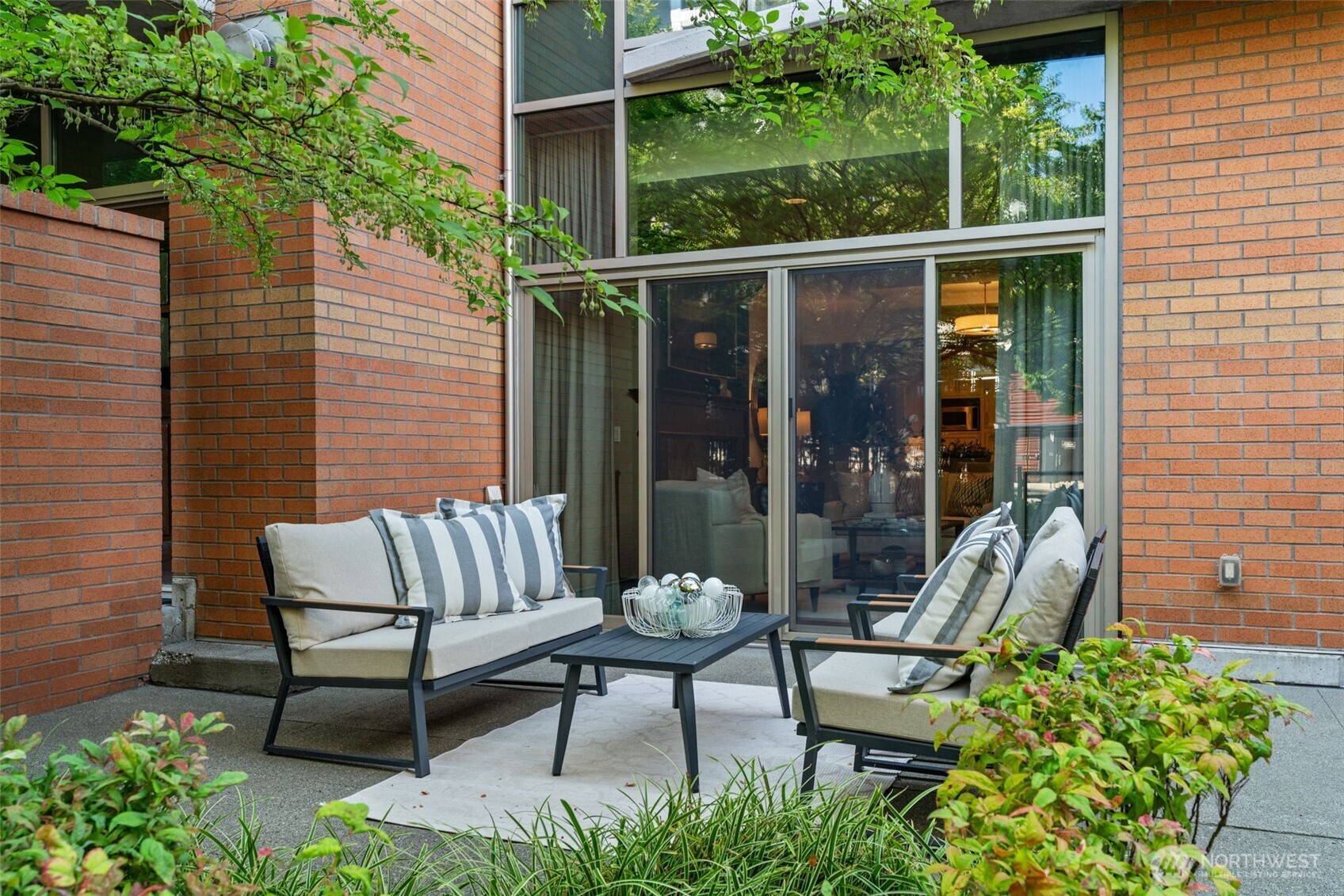 10616 Northeast 9th Place, Unit TH4 Bellevue, WA 98004 - Photo 30 of 39 a view of a two chairs in the patio