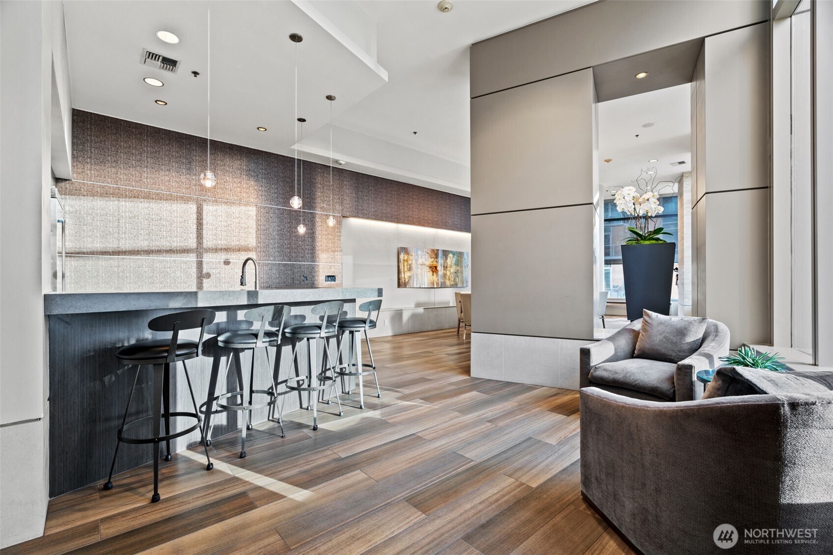 10616 Northeast 9th Place, Unit TH4 Bellevue, WA 98004 - Photo 33 of 39 a living room with furniture and wooden floor