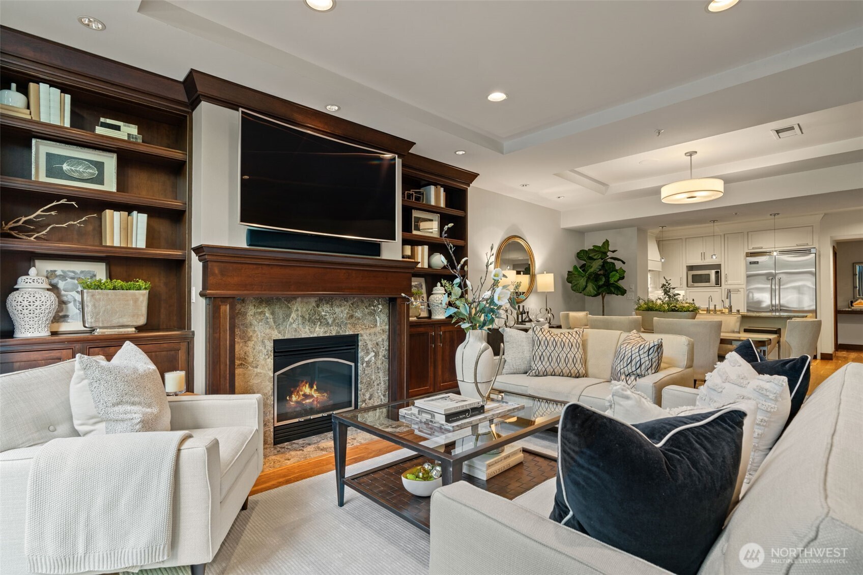 10616 Northeast 9th Place, Unit TH4 Bellevue, WA 98004 - Photo 4 of 39 a living room with furniture fireplace and a flat screen tv