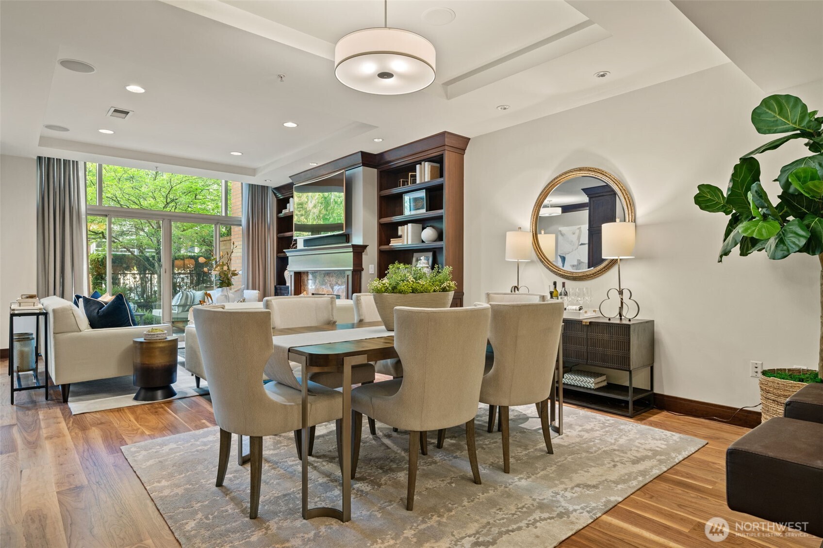 10616 Northeast 9th Place, Unit TH4 Bellevue, WA 98004 - Photo 8 of 39 a dining room with furniture a rug and a large window