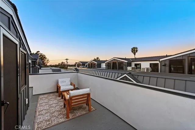 a view of a terrace with chairs