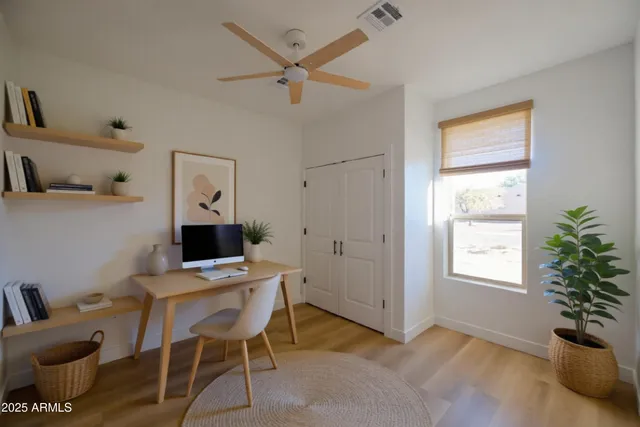 a workspace with furniture and window