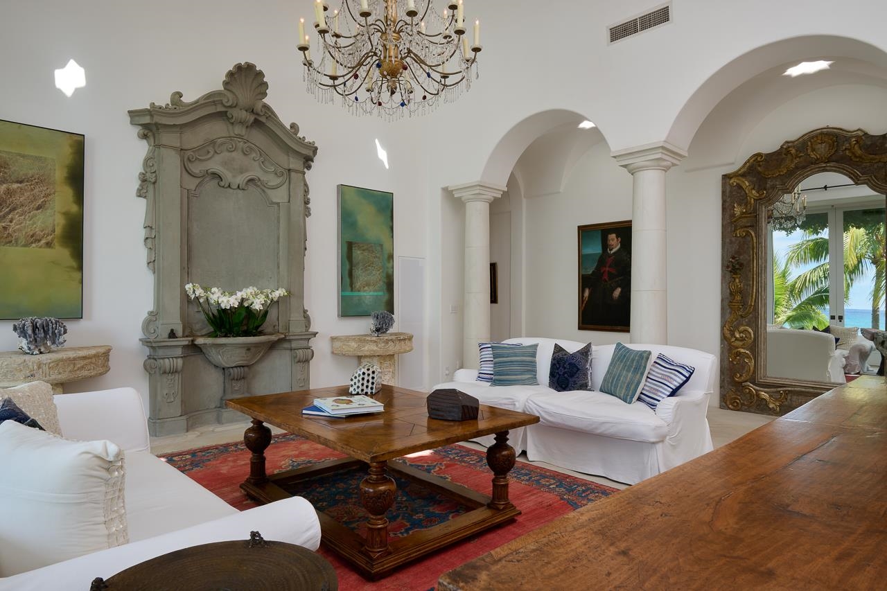 51 Hui Road East Lahaina, HI 96761 - Photo 15 of 49 a living room with furniture a rug and a chandelier