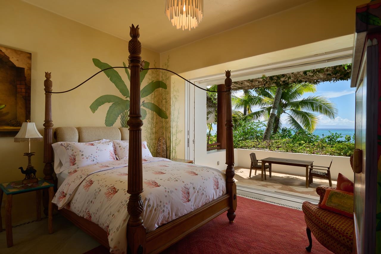 51 Hui Road East Lahaina, HI 96761 - Photo 31 of 49 a bed sitting in a bedroom next to a window