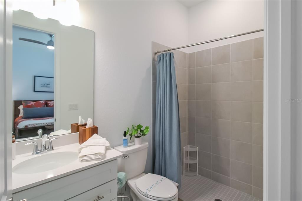 17335 Jadestone Court Venice, FL 34293 - Photo 20 of 54 a bathroom with a sink toilet and shower