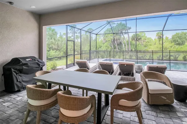 a view of a balcony with yard