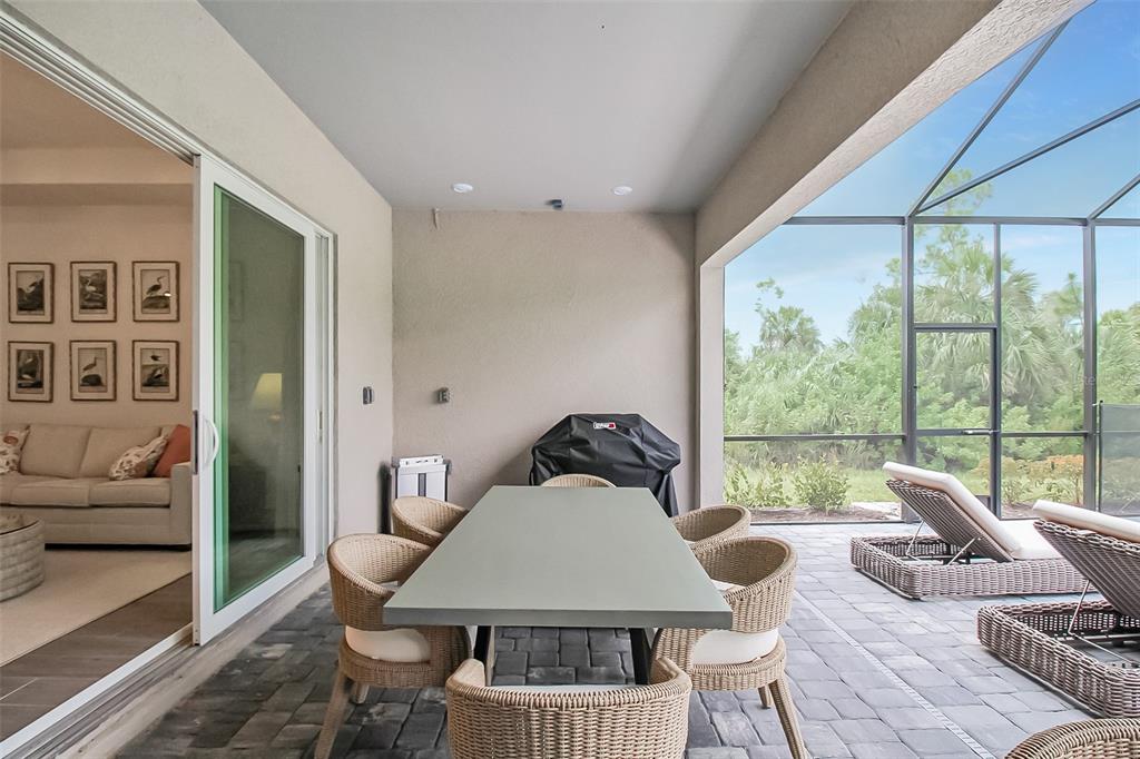 17335 Jadestone Court Venice, FL 34293 - Photo 47 of 54 a view of a dining room with furniture window and outside view