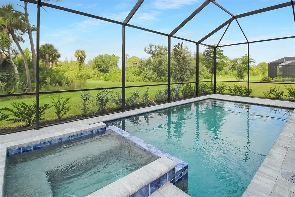 17335 Jadestone Court Venice, FL 34293 - Photo 50 of 54 a view of a balcony with yard