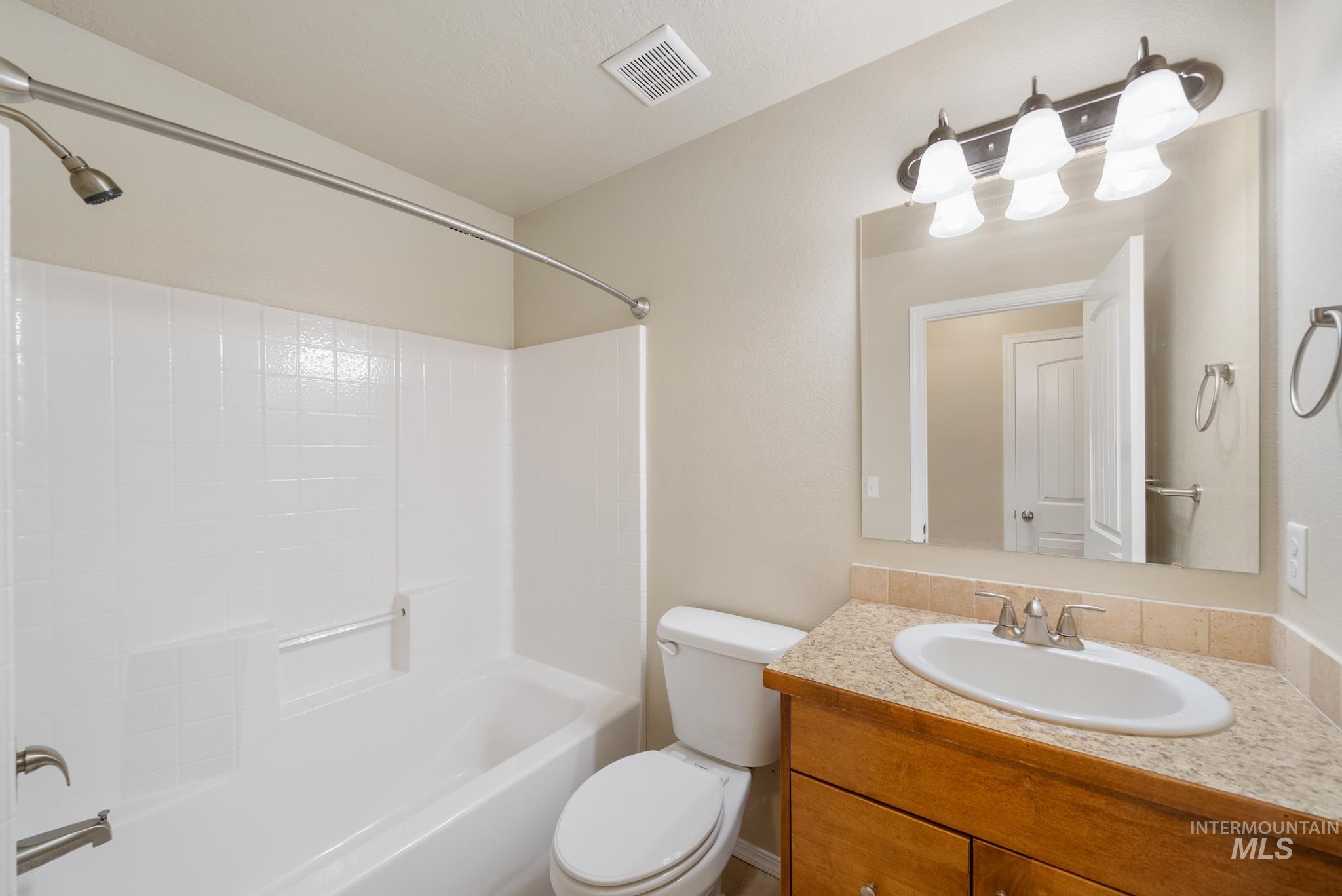 19081 Harley Way Caldwell, ID 83605 - Photo 20 of 35 Full bath featuring washtub / shower combination and vanity