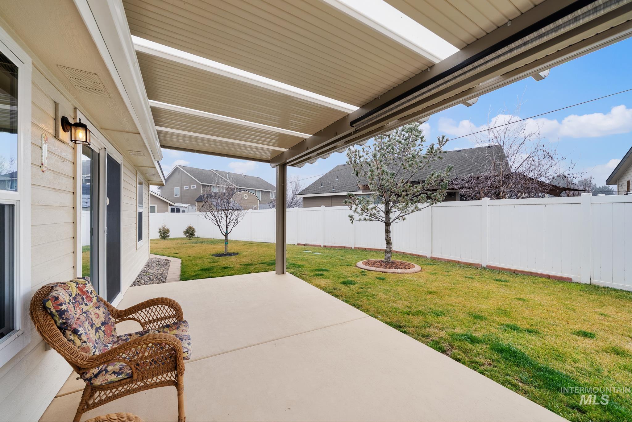 19081 Harley Way Caldwell, ID 83605 - Photo 25 of 35 Fenced backyard featuring a patio area