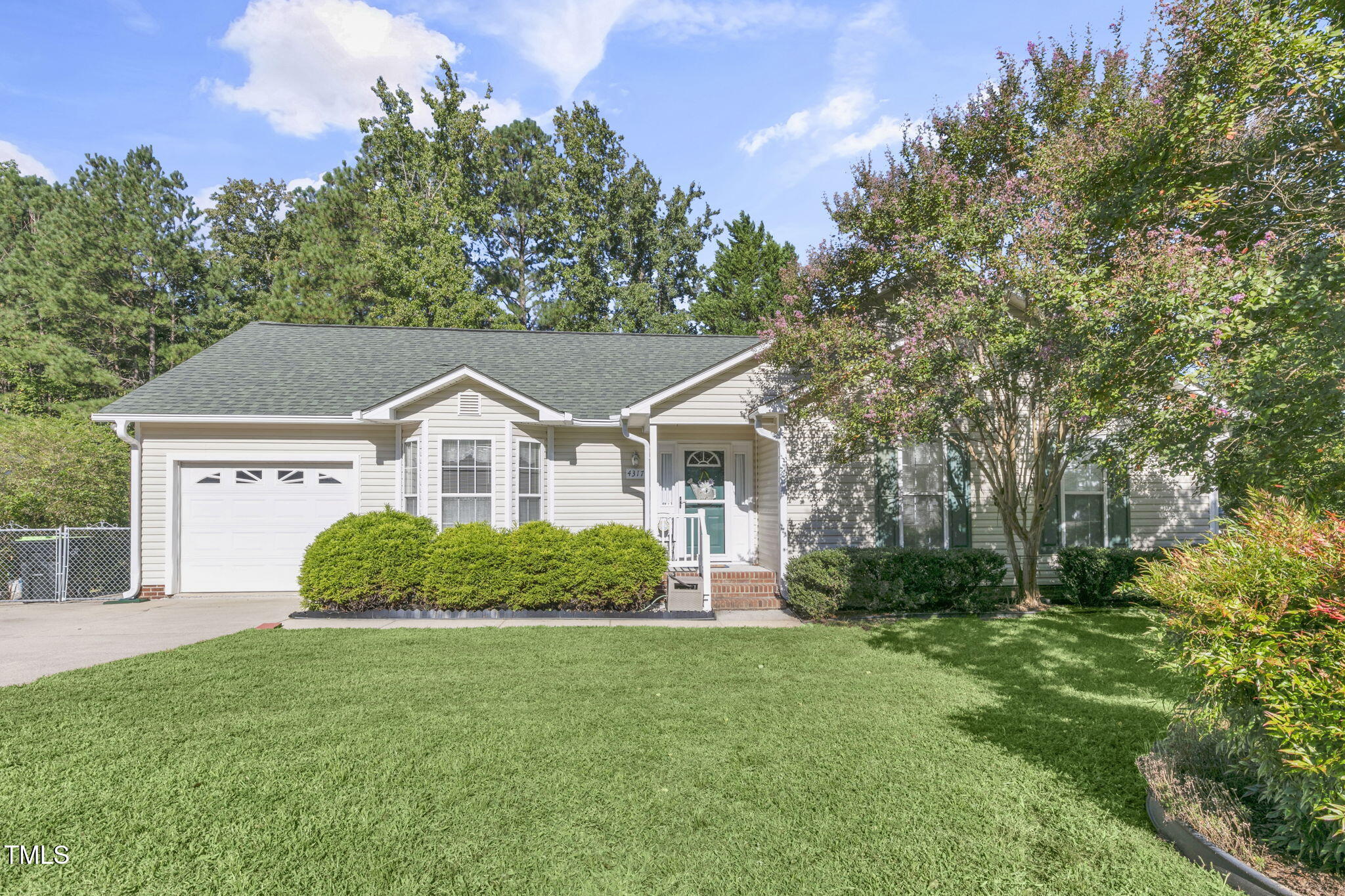 4317 Snow Goose Court Raleigh, NC 27616 - Photo 1 of 43 a front view of a house with a yard