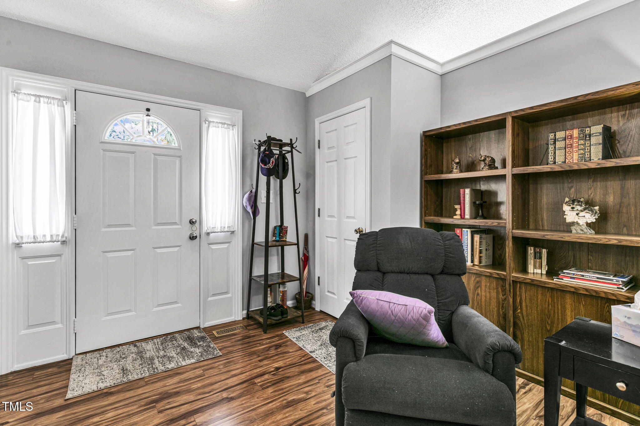 4317 Snow Goose Court Raleigh, NC 27616 - Photo 18 of 43 a living room with furniture or window and a wooden floor