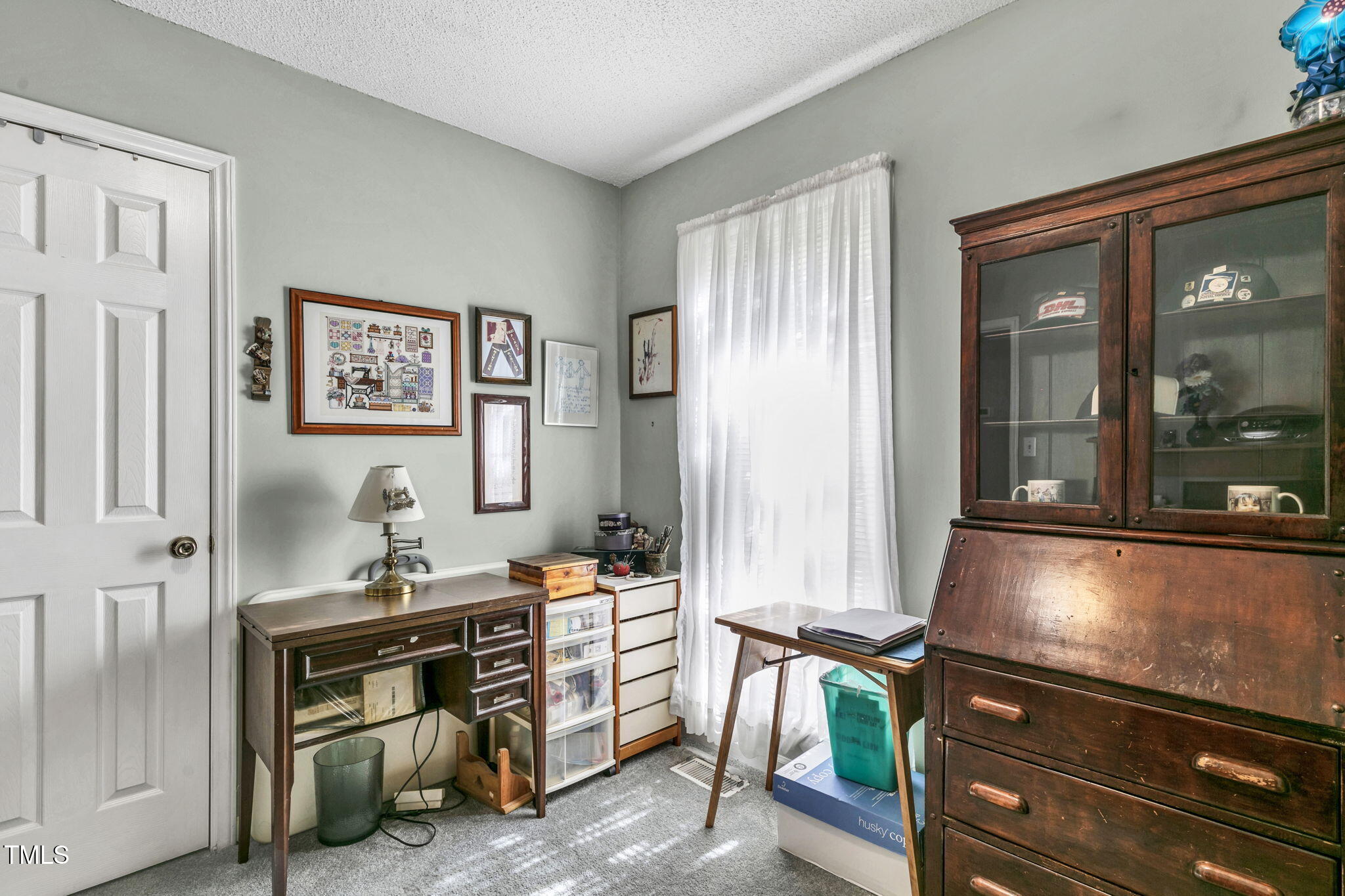 4317 Snow Goose Court Raleigh, NC 27616 - Photo 21 of 43 a living room with furniture and a window