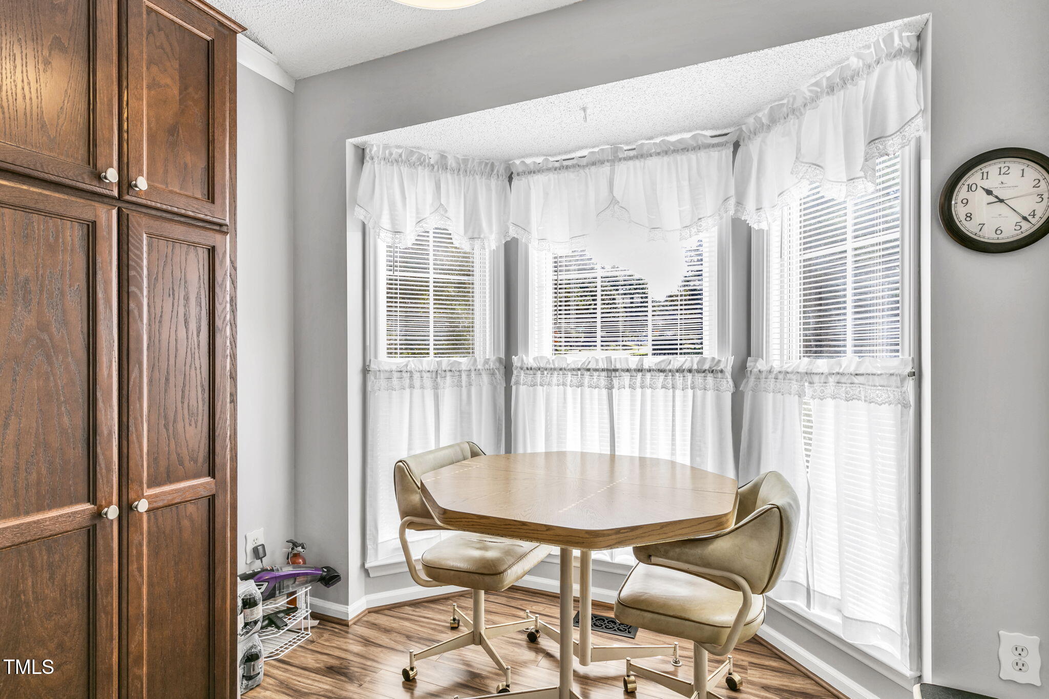4317 Snow Goose Court Raleigh, NC 27616 - Photo 33 of 43 a view of a dining room with furniture and a window