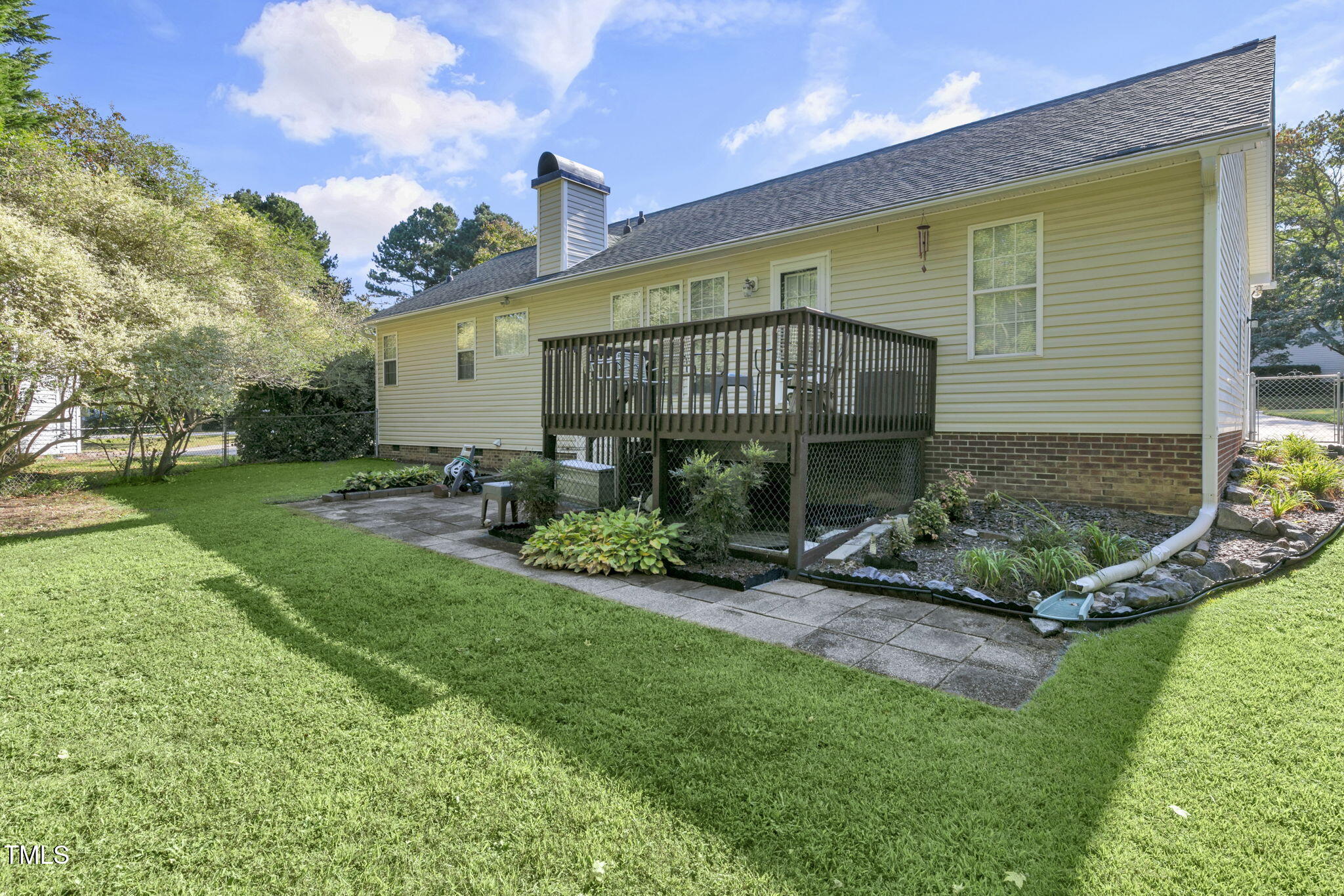 4317 Snow Goose Court Raleigh, NC 27616 - Photo 36 of 43 a front view of a house with garden