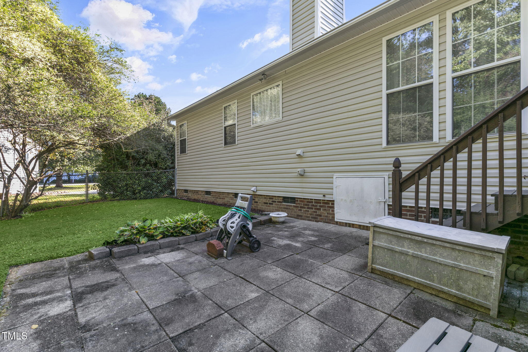 4317 Snow Goose Court Raleigh, NC 27616 - Photo 39 of 43 a view of backyard with deck and garden