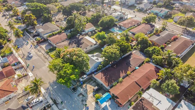 an aerial view of a city with lots of residential buildings
