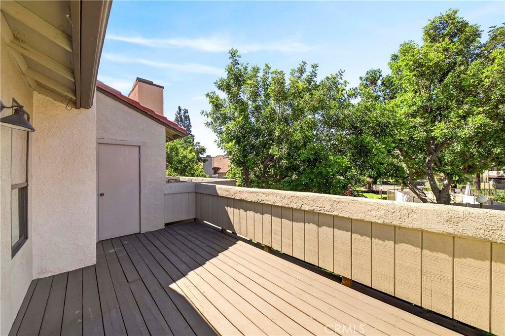 10151 Arrow Route, Unit 26 Rancho Cucamonga, CA 91730 - Photo 20 of 35 a view of balcony with wooden floor