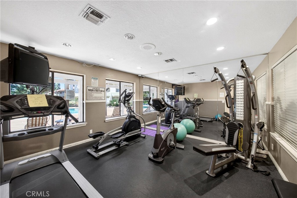 10151 Arrow Route, Unit 26 Rancho Cucamonga, CA 91730 - Photo 22 of 35 a view of a room with gym equipment