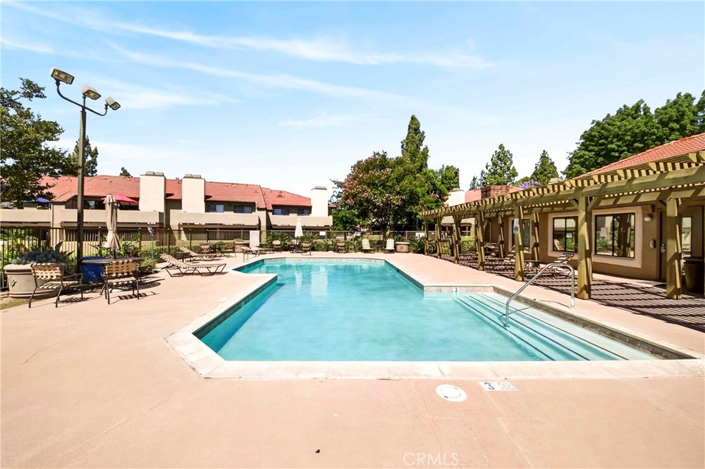 10151 Arrow Route, Unit 26 Rancho Cucamonga, CA 91730 - Photo 23 of 35 a view of outdoor space swimming pool and furniture