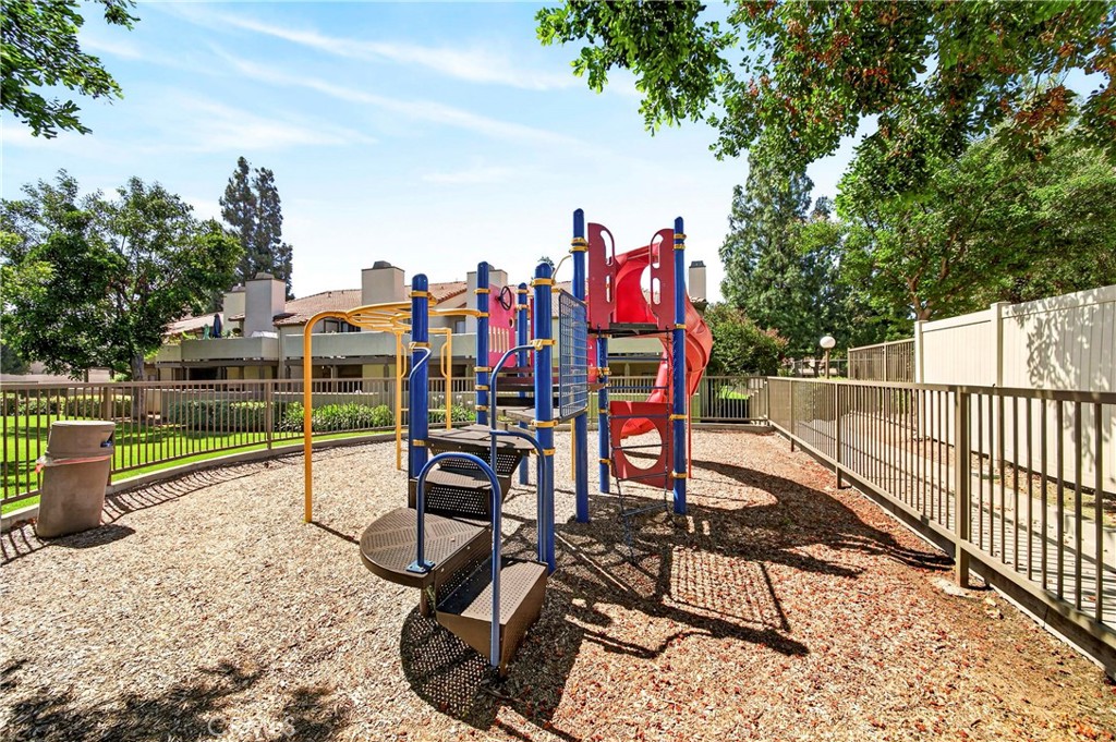10151 Arrow Route, Unit 26 Rancho Cucamonga, CA 91730 - Photo 27 of 35 a view of a chairs and table on the wooden floor