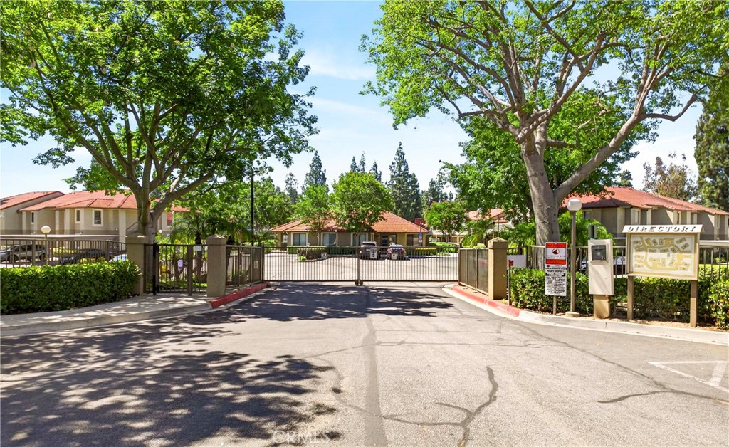 10151 Arrow Route, Unit 26 Rancho Cucamonga, CA 91730 - Photo 35 of 35 a street view with large trees