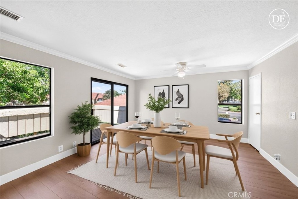 10151 Arrow Route, Unit 26 Rancho Cucamonga, CA 91730 - Photo 9 of 35 a view of a dining room with furniture and window