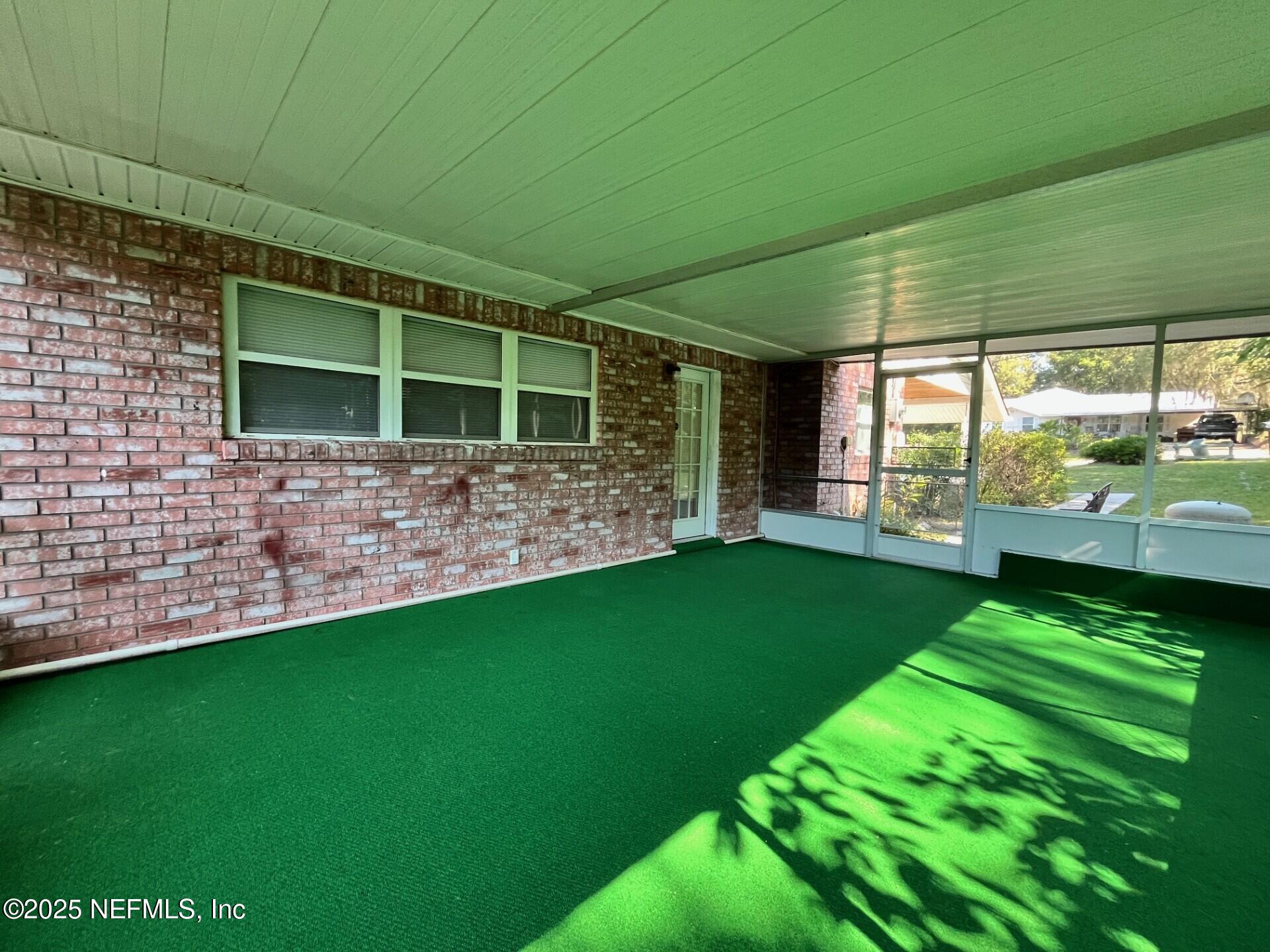 107 Weerts Road San Mateo, FL 32187 - Photo 22 of 33 Weerts Screened Room 1