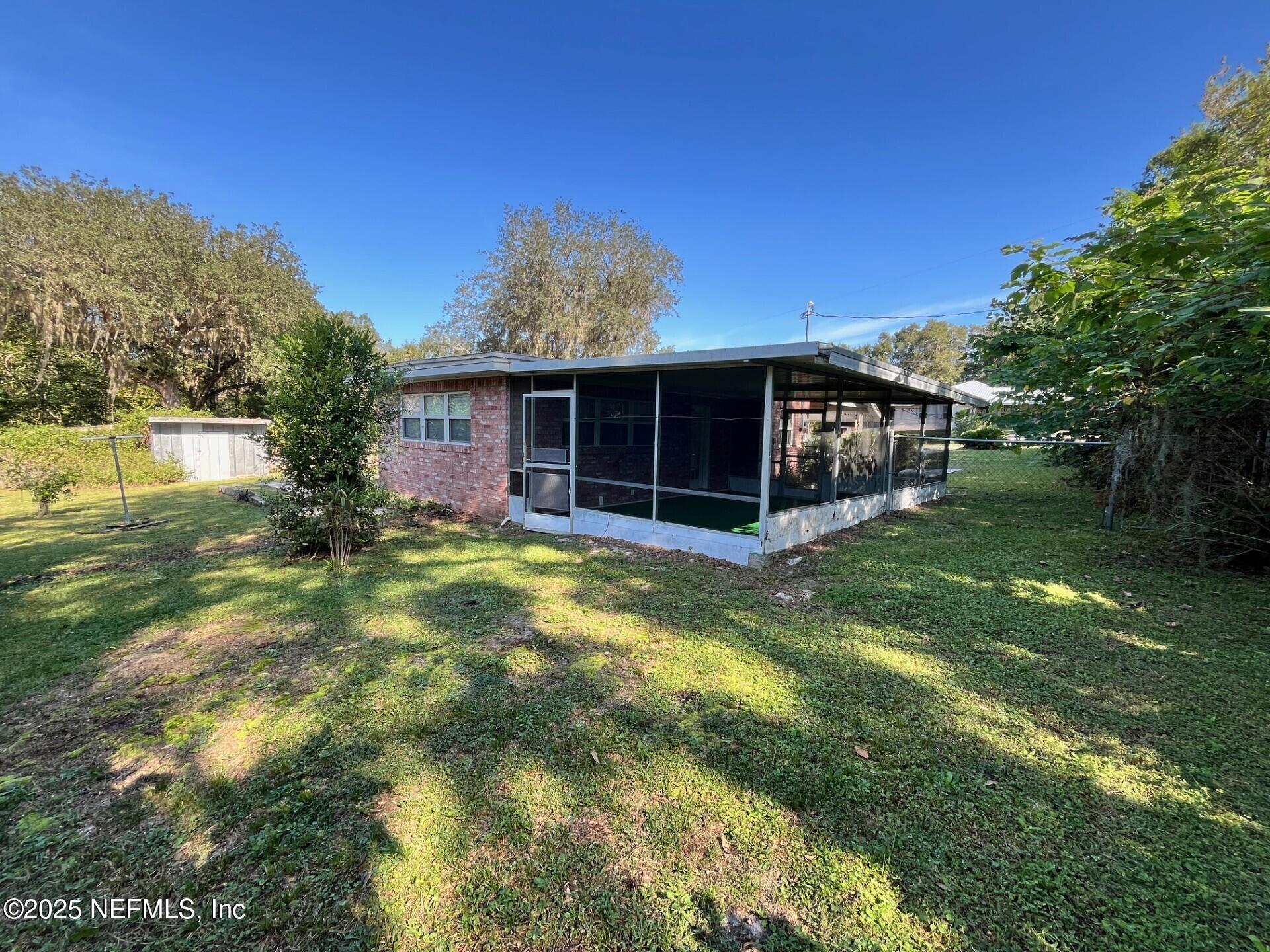 107 Weerts Road San Mateo, FL 32187 - Photo 28 of 33 Weerts Screened Room