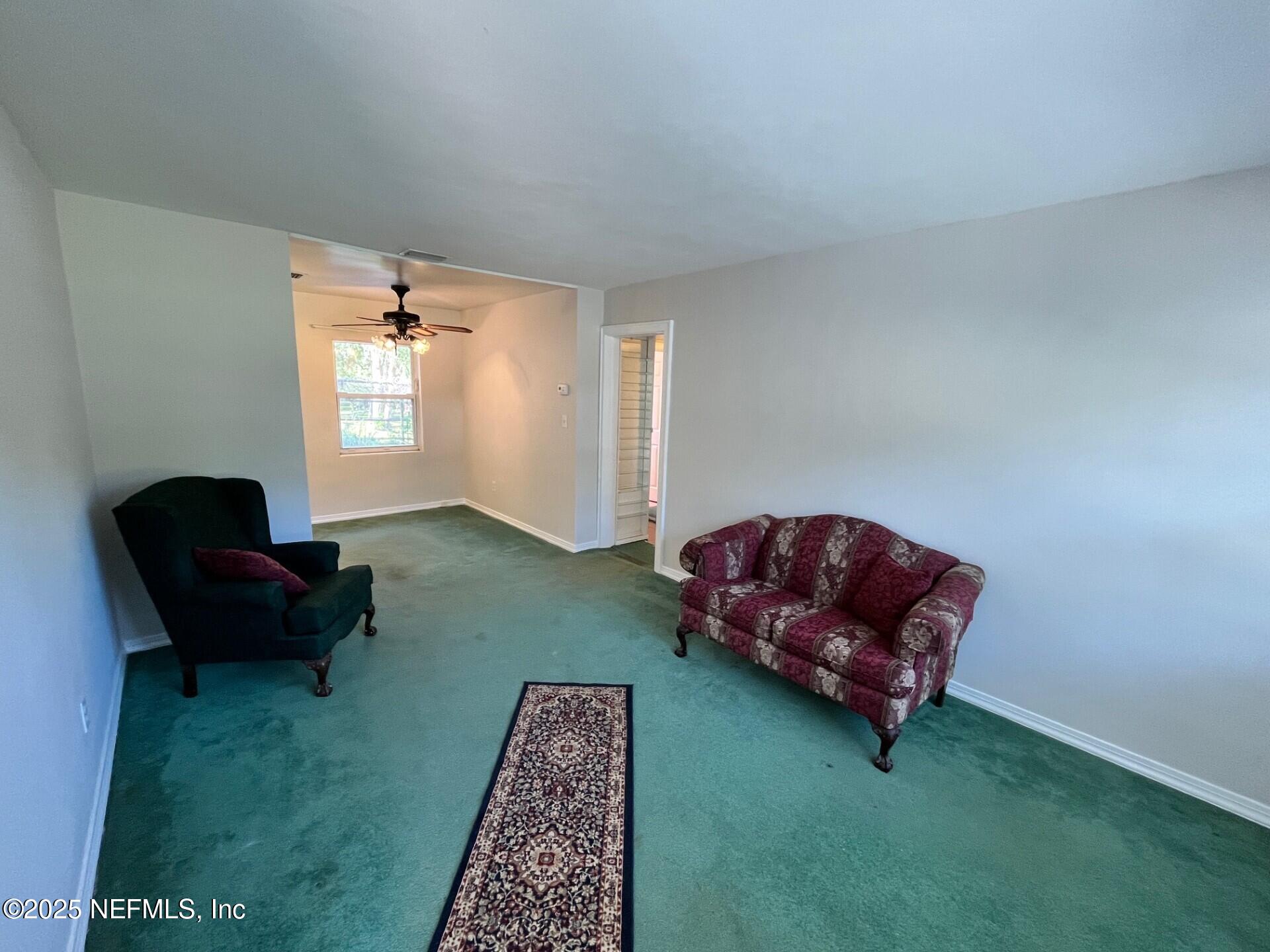107 Weerts Road San Mateo, FL 32187 - Photo 4 of 33 Weerts Living to Dining