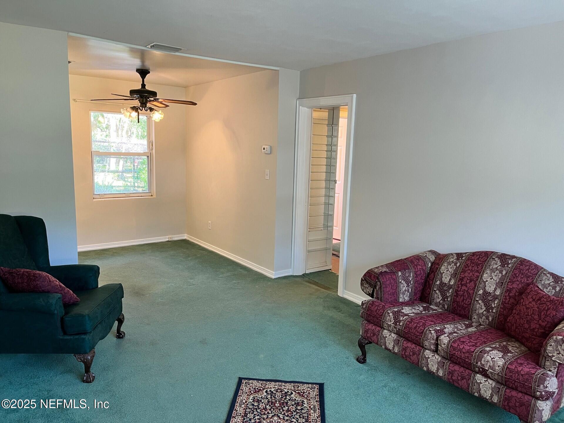 107 Weerts Road San Mateo, FL 32187 - Photo 5 of 33 Weerts Living Room 2