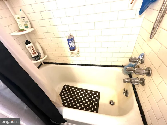 a bathroom with a bathtub
