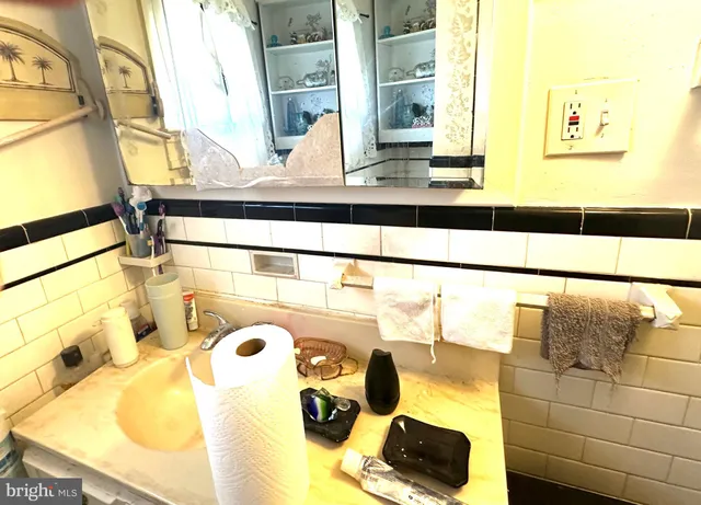 a bathroom with a mirror