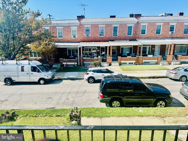 a car parked in front of a building