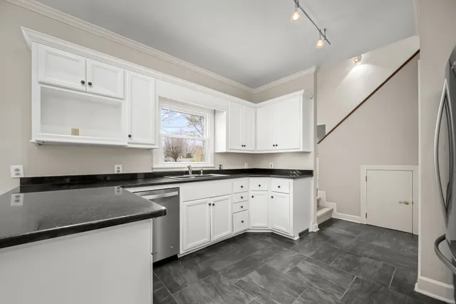 a bathroom with a shower and a toilet