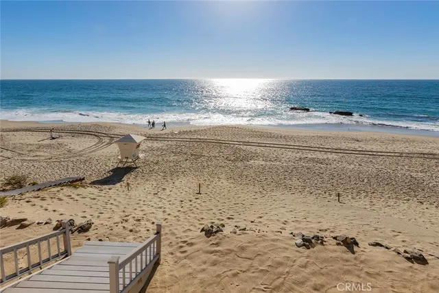 a view of beach and kitchen