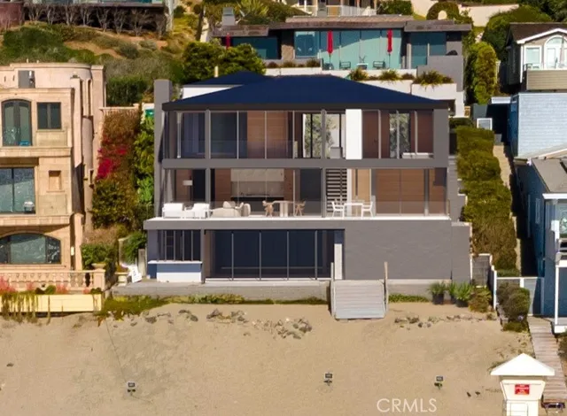 a front view of a building with a yard