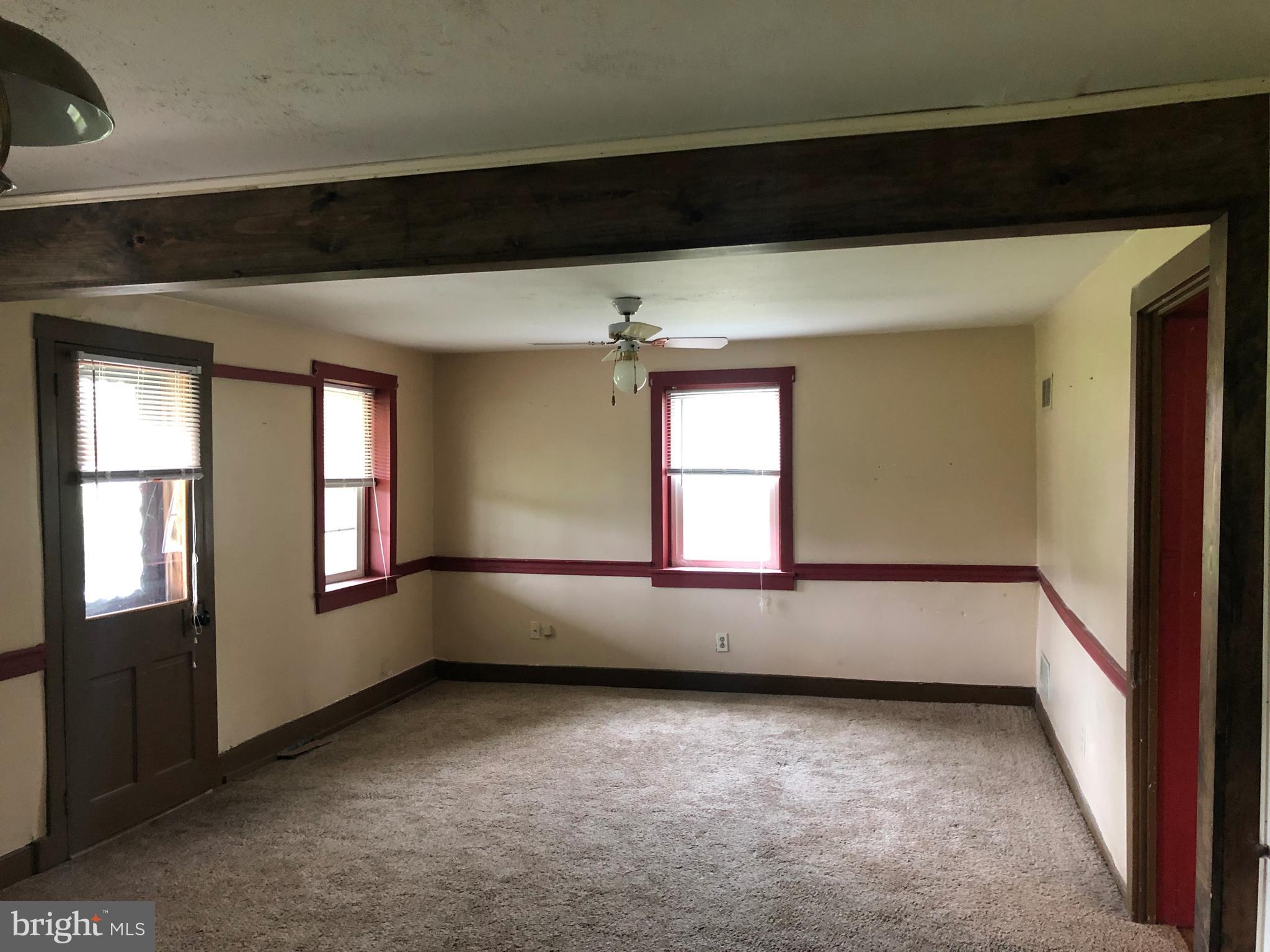 11 Binder Road Stevens, PA 17578 - Photo 11 of 20 Living Room , ceiling fan, 2 doors to porch