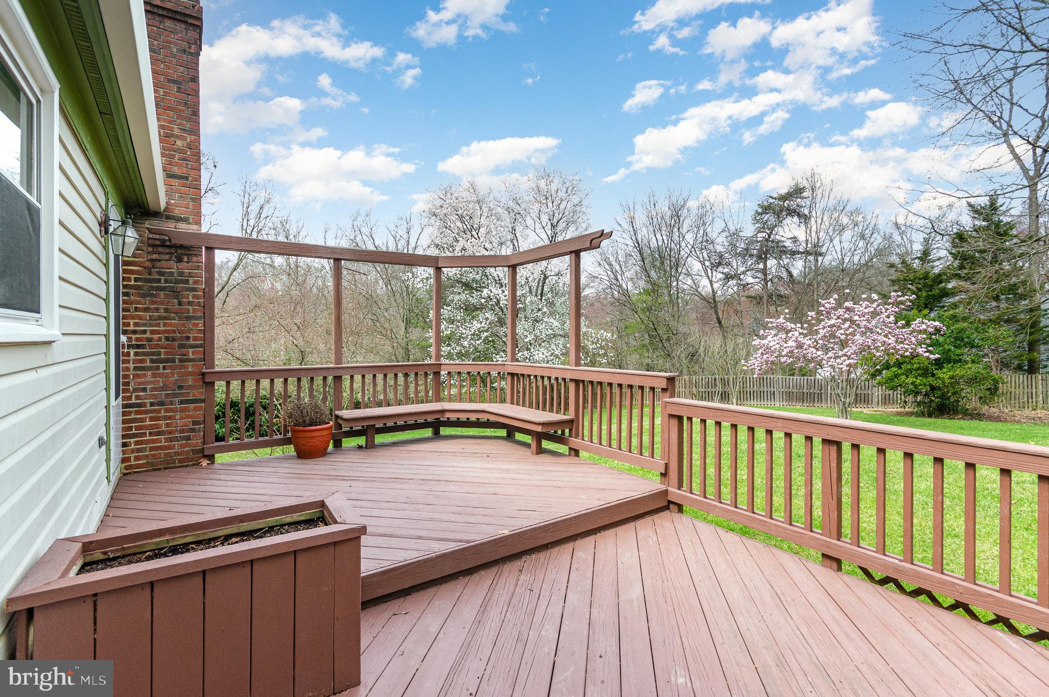 7715 Fort Hunt Road Alexandria, VA 22308 - Photo 17 of 21 a view of a balcony with wooden floor and iron fence